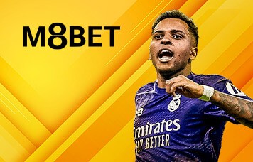 M8BET sportsbook promotion featuring a Real Madrid player celebrating in a purple jersey.